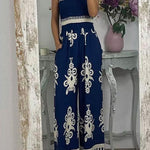 Margovil Off Shoulder Smocked High Waist Wide Leg Printed Jumpsuit afbeelding 2